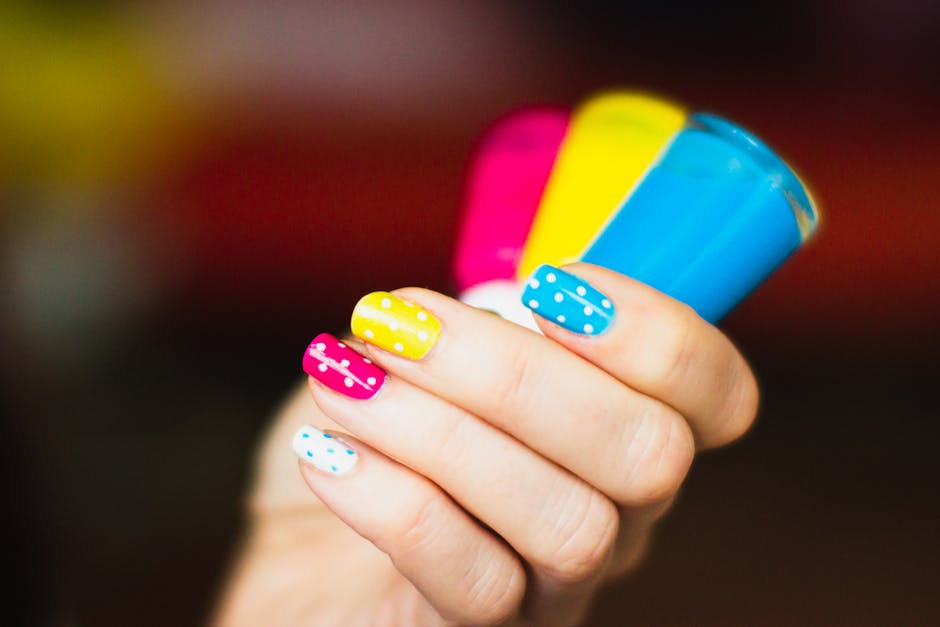 Patterned nail art designs alongside polish bottles
