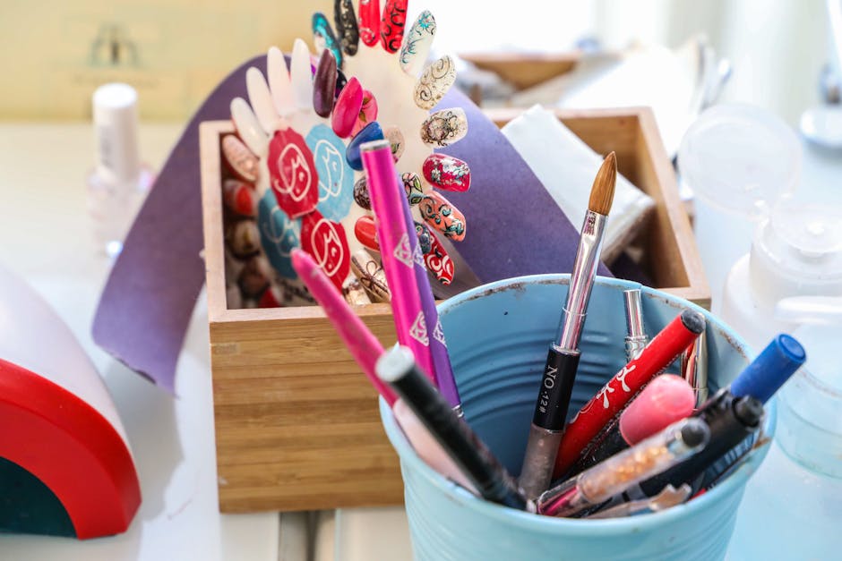 Colorful nail-care tools laid out on desk